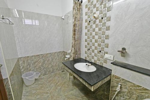 white house villa close to rock beach