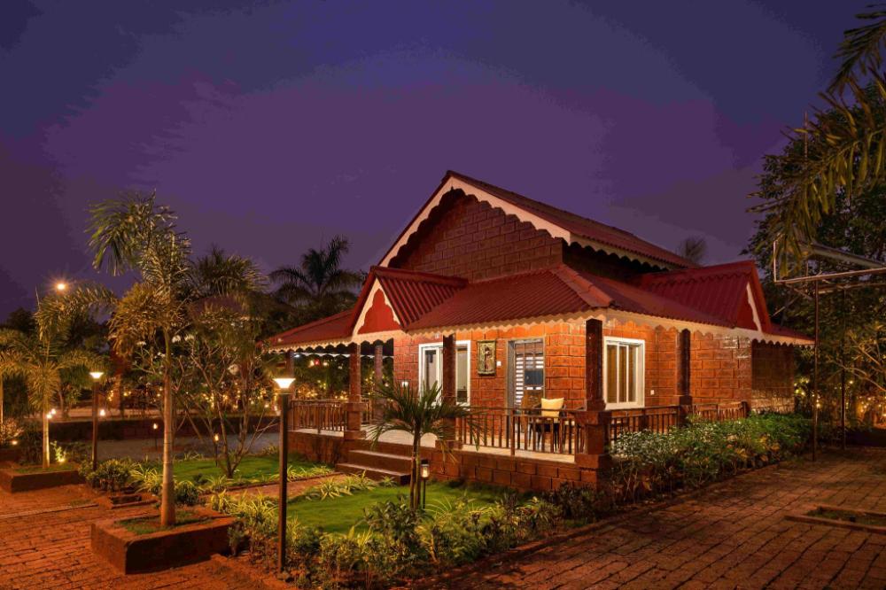 crimson bricks and woods resort cottages karjat