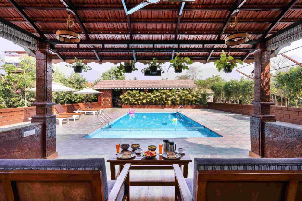 crimson bricks and woods resort cottages karjat