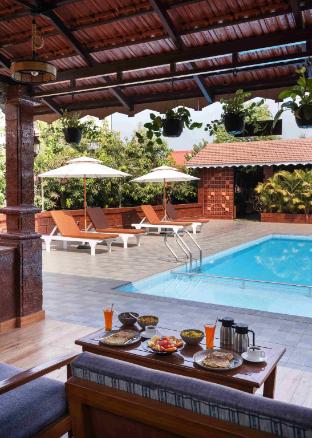 crimson bricks and woods resort cottages karjat