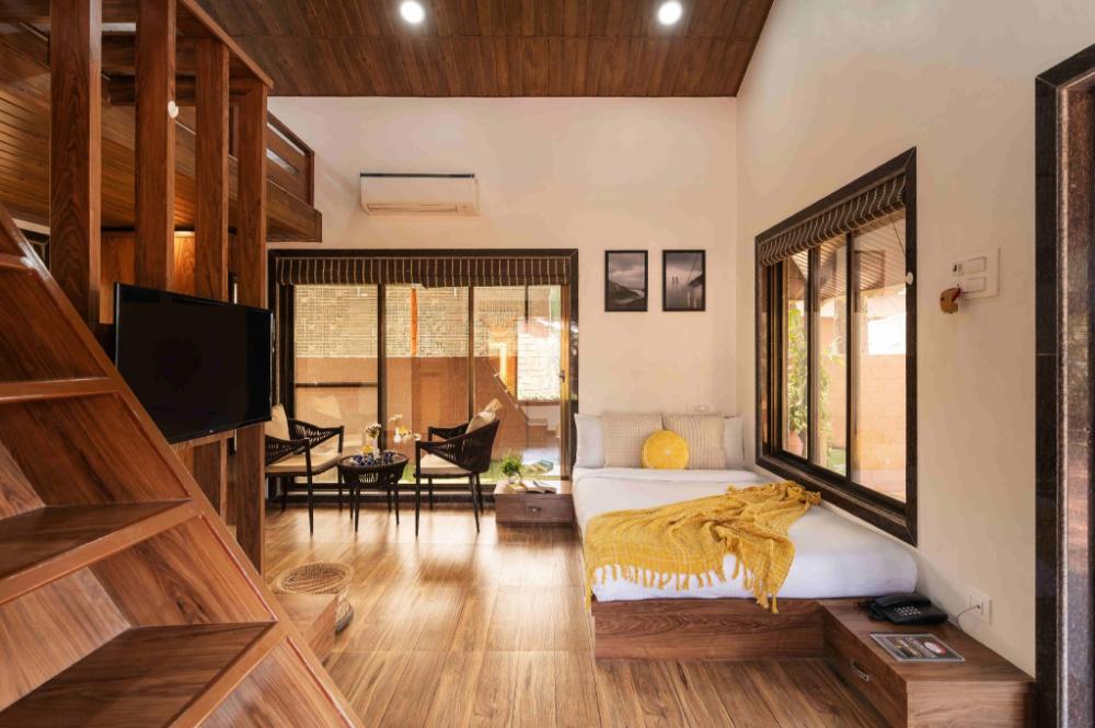 crimson bricks and woods resort cottages karjat