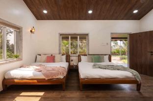 crimson bricks and woods resort cottages karjat