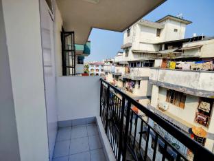 cozy guwahati apartment with city and mountain views