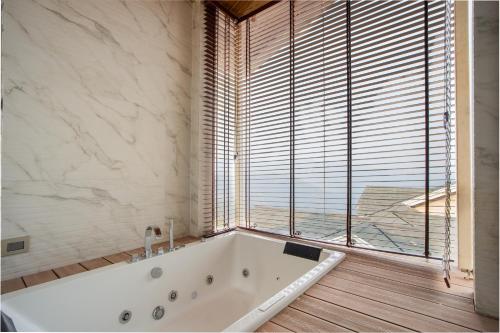 elivaas prive the royce daisy ultra luxe 4 bhk villa with pvt heated pool jacuzzi steam room and hill views
