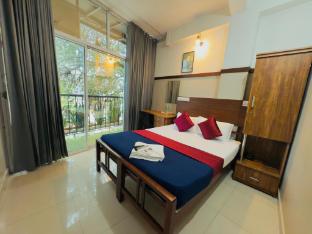 rio rooms calicut near mims