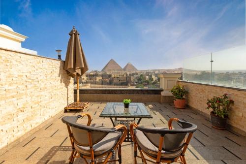 Pyramids Yard Hotel,Al Mansoureya Rd,3 star