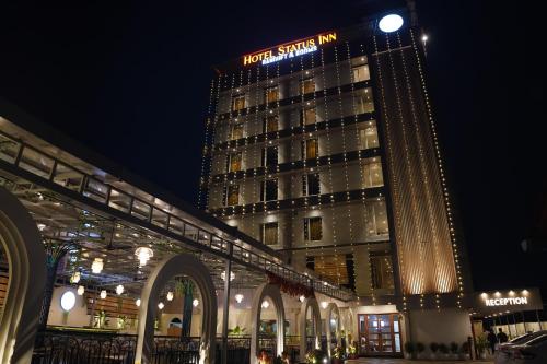 hotel status inn