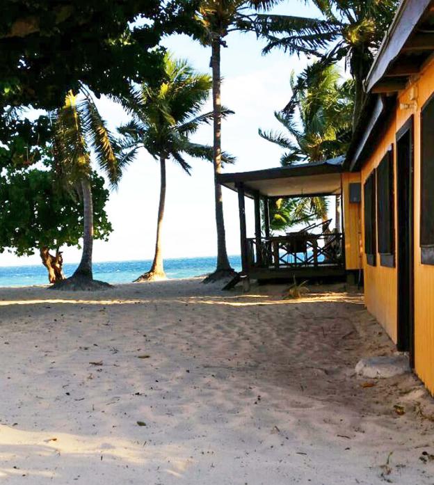 ratu kini backpackers and dive resort