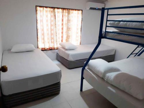 ratu kini backpackers and dive resort