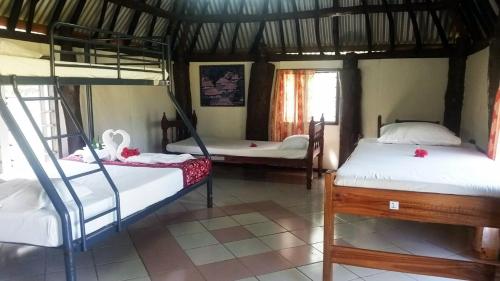 ratu kini backpackers and dive resort