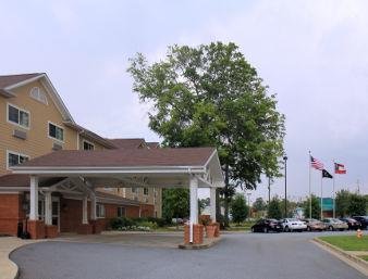 sleep inn and suites columbus next to fort moore