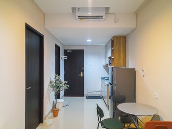 comfort stay 1br at patraland amarta apartment