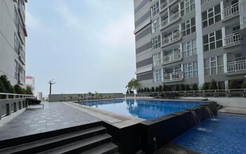 tiny studio with pool view at taman melati surabaya apartment