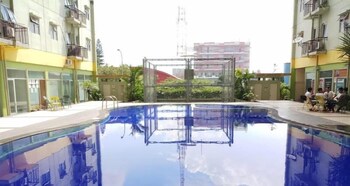 the modern 2br at suites metro apartment