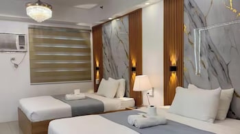 relax in pasay citys best kept secret spacious condo with garden view