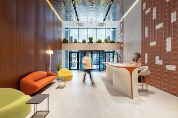 next white aparthotel official