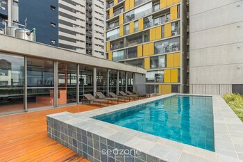 modern accommodations in a building with a pool in the heart of sp yhes