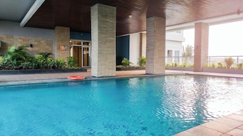 studio room apartment at grand dhika city near jatimulya lrt station