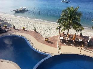 sunset at aninuan beach resort