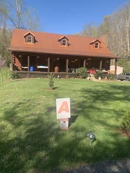 Log Cabin In The Field