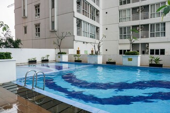 cozy minimalist studio taman melati margonda apartment by travelio