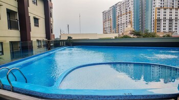 minimalist studio apartment at atria residences with pool view