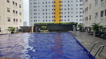Homey And Fresh 2Br Green Pramuka Apartment,,0 star