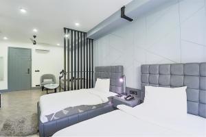 bedchambers serviced apartment mg road