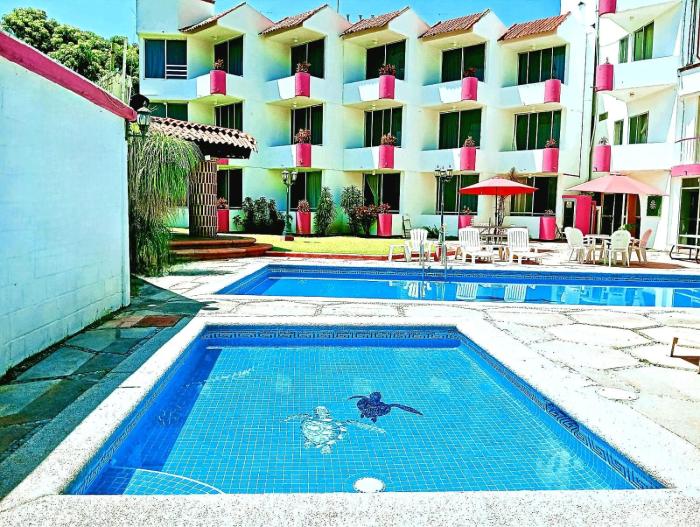 Capital O Hotel Hacienda Del Rio