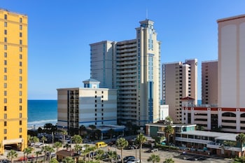 stunning condo with wall to wall windows overlooking ocean