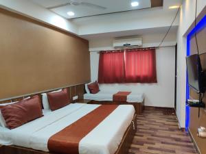 Hotel Nova Prime,Thaltej>>Ahmedabad,2 star