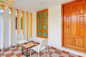 capital o 84184 pop tavern kazhakkottam