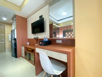 cozy studio room at oasis cikarang apartment