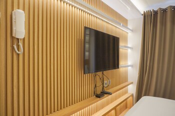 homey living studio room at tokyo riverside pik 2 apartment