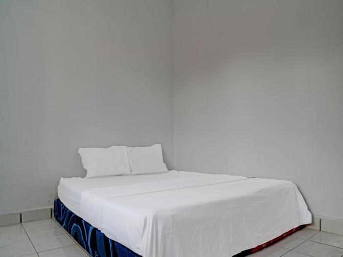 spot on 92856 home stay syariah aom kusman