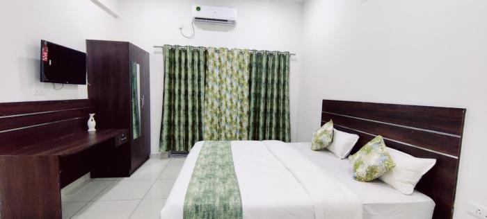 suvarna elite premium apartment hotel