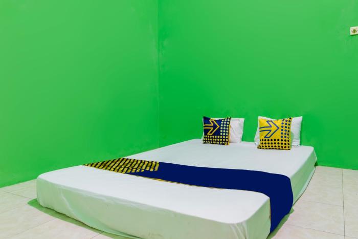 Spot On 94028 Homestay Pak To Syariah,,2 star