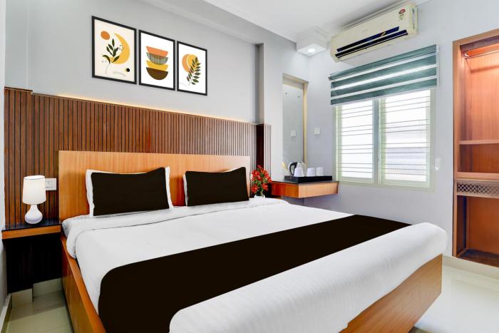 super collection o market road ernakulam