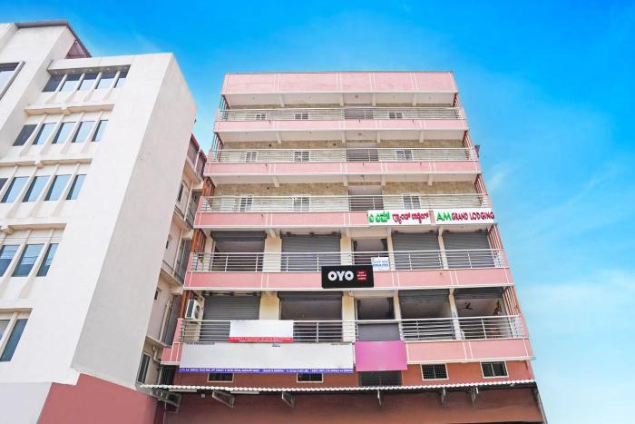 Hotel O Am Grand Residency,#115A.M Complex, Police Road, Opp Chickpet Metro Station, Bangalore,3 star
