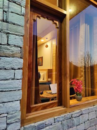 tirthan stone age inn