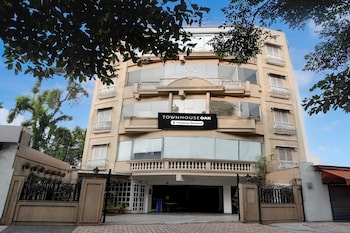 elegant stays with rooftop restro and hill view