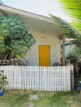 beachfront villa with sunset