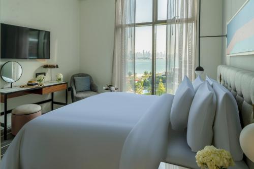 th8 palm dubai beach resort vignette collection