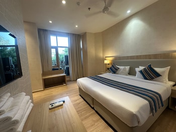 hotel bluestone prime nehru place by the cosy hotels
