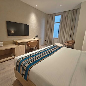 hotel bluestone prime nehru place by the cosy hotels